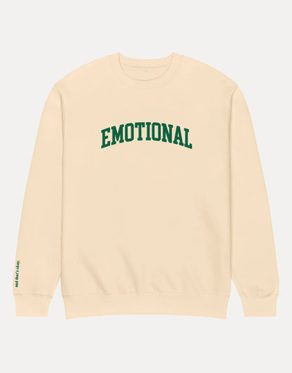 Beige sweatshirt with 'EMOTIONAL' in green text on a white background